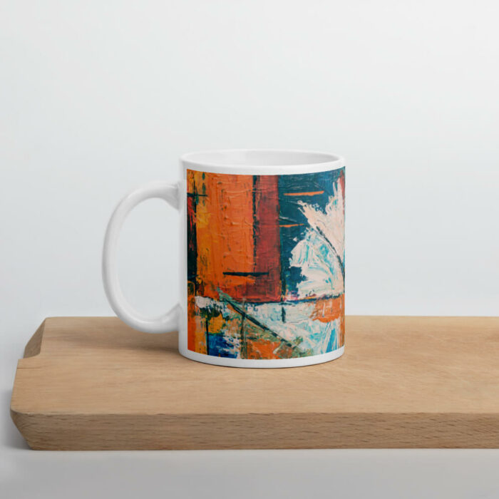 Cốc sứ hình vẽ tranh trừu tượng màu xanh, cam và trắng