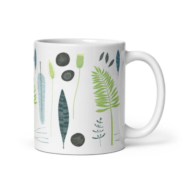 Cốc sứ họa tiết hình lá, đá và lông vũ Cốc sứ họa tiết hình lá, đá và lông vũ